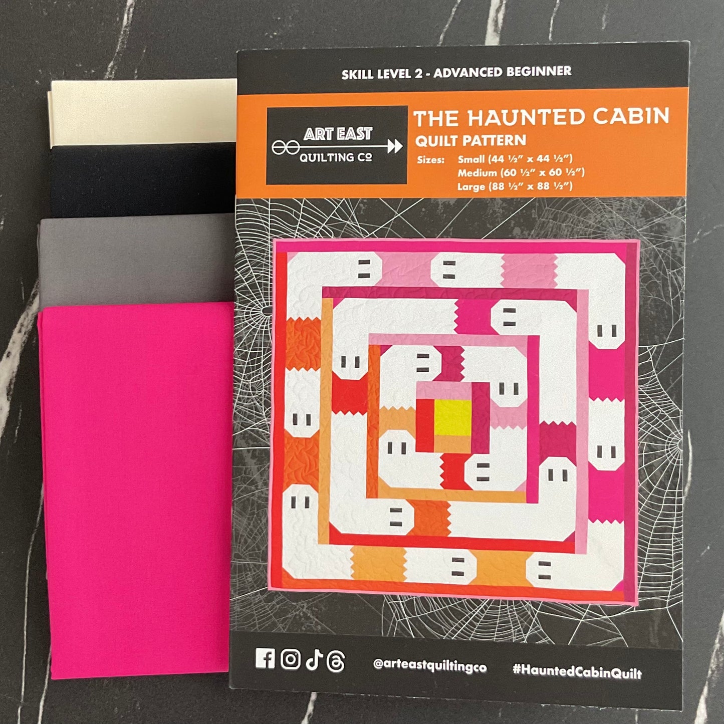 The Haunted Cabin Halloween Quilt Kit featuring Pure Solids - Two Color Ways
