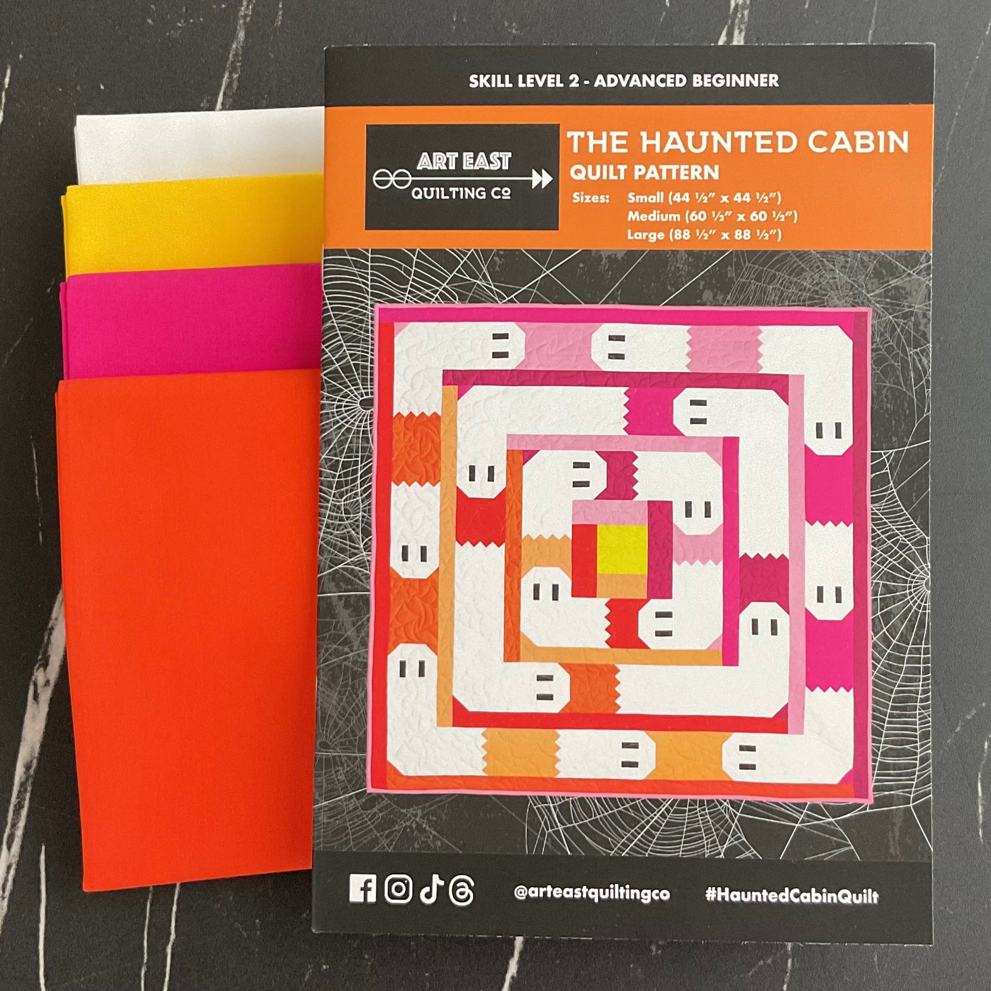 The Haunted Cabin Halloween Quilt Kit featuring Pure Solids - Two Color Ways